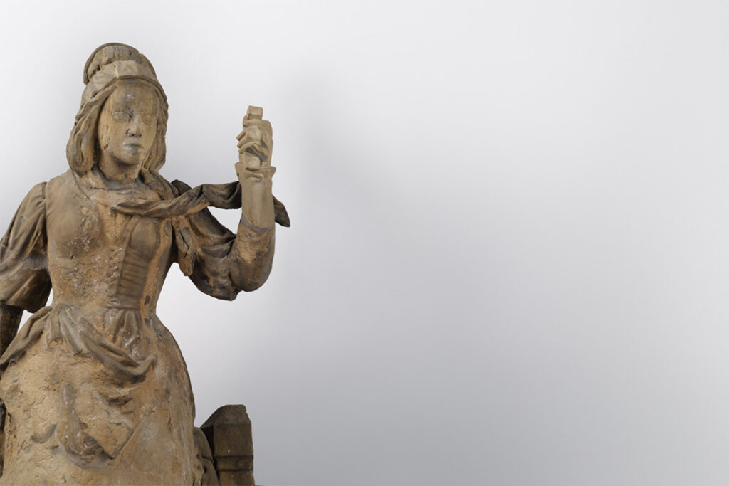 Zu sehen ist die Statue der Schneiderfrau.